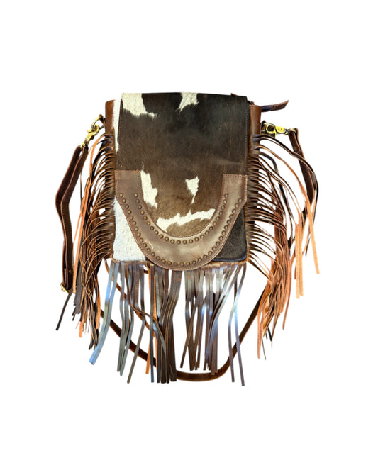 77052 -  Brown and White Cowhide Crossbody Bag with flap and brown suede fringe