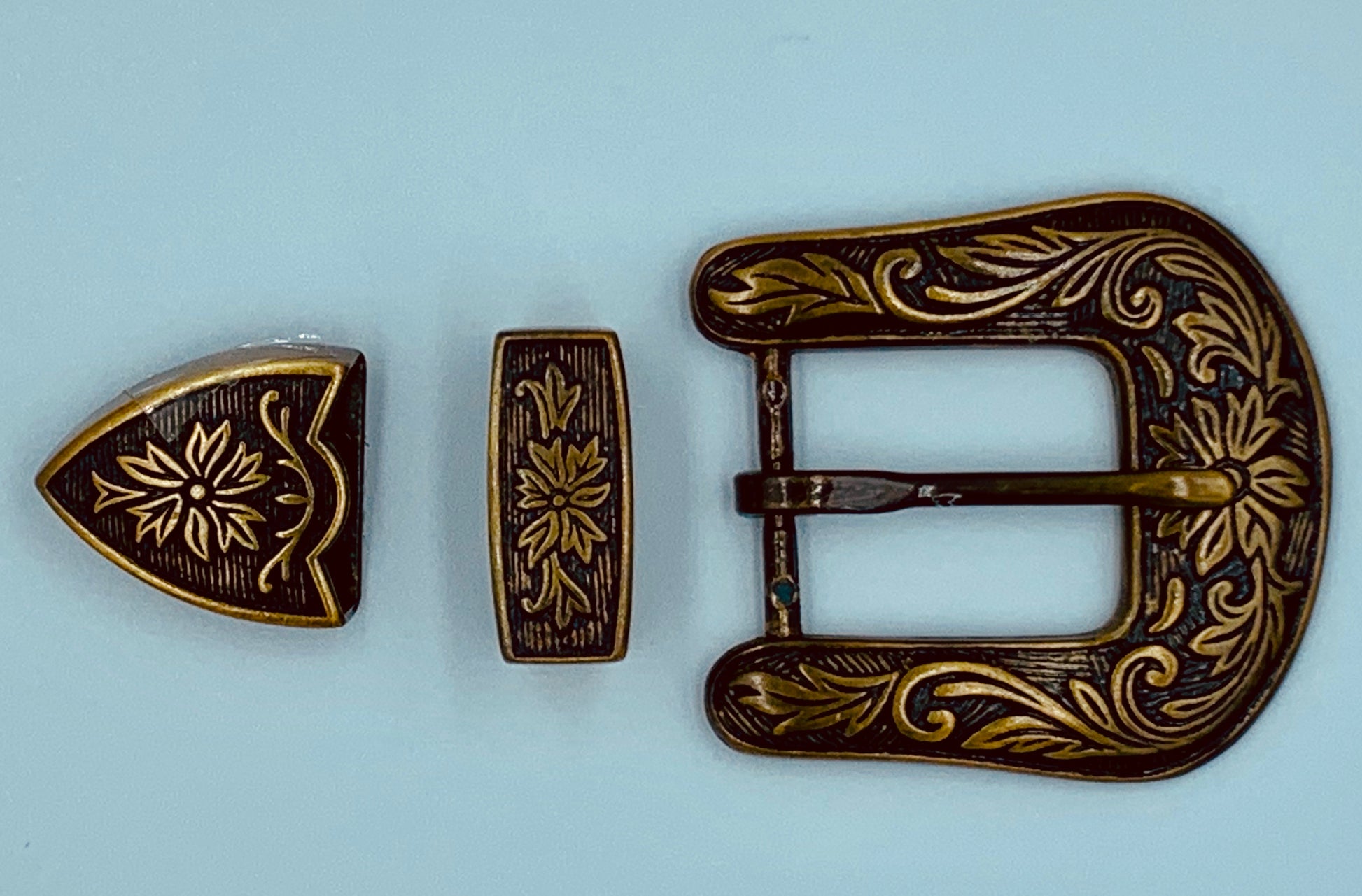 A7239 - Antique Brass Floral Buckle & tips - Rawhide Western Wear 